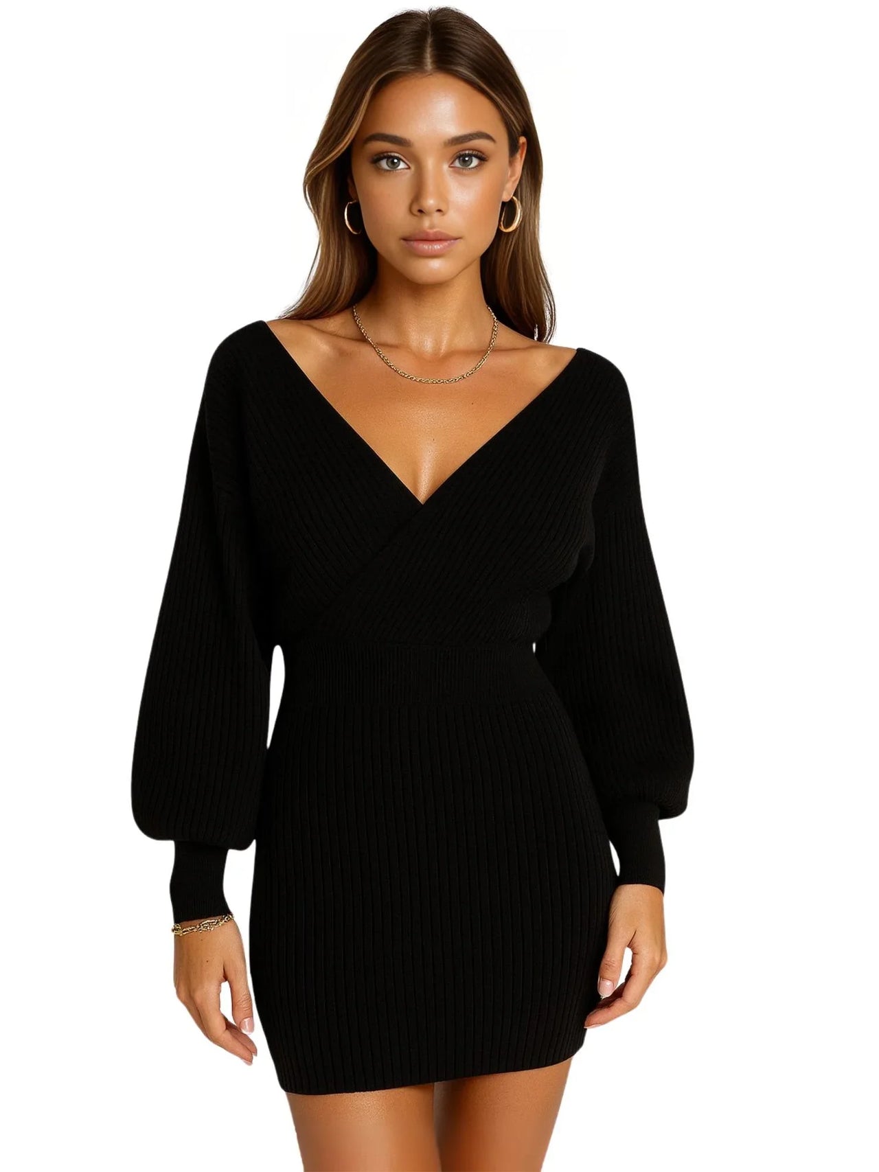 Woman wearing a mini black sweater dress on a white background