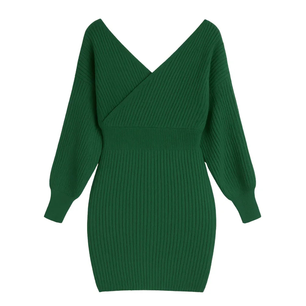 Green sweater dress on a white background
