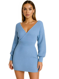 Thumbnail for Woman wearing a light blue sweater dress on a white background