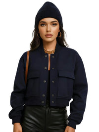 Thumbnail for Woman wearing a navy blue jacket and beanie on a white background