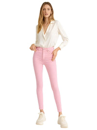 Thumbnail for Woman wearing a white blouse and pink jeans on a white background