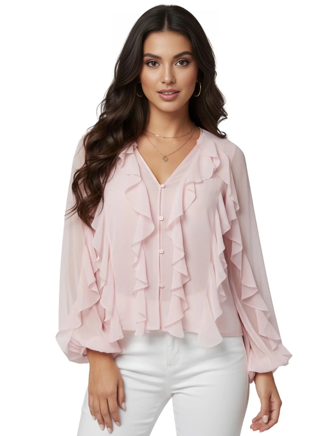 Woman wearing a light pink blouse with ruffled details on a white background
