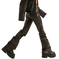 Thumbnail for Brown leather pants with brown platform slouch boots on a white background