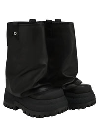 Thumbnail for Black platform slouch boots on a white background