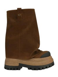 Thumbnail for Brown platform slouch boots with a black sole on a white background