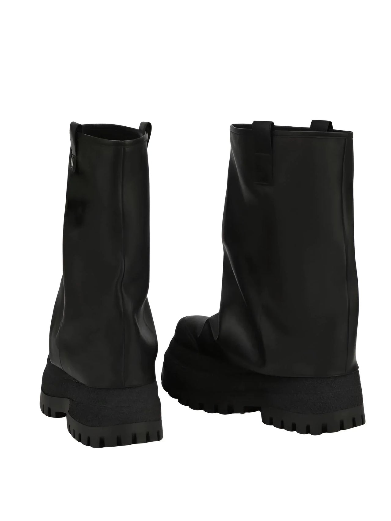 Pair of black leather platform slouch boots on a white background