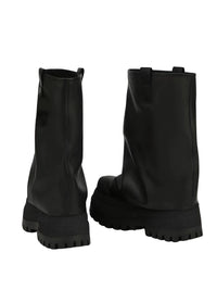 Thumbnail for Pair of black leather platform slouch boots on a white background
