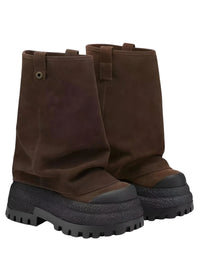 Thumbnail for Pair of brown platform slouch boots with black soles on a white background