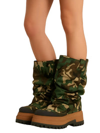 Thumbnail for Woman wearing camouflage platform slouch boots on a white background