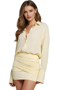 Thumbnail for Woman wearing a light yellow dress with a plain background