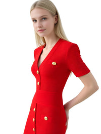 Thumbnail for Woman wearing a red dress with gold buttons on a white background