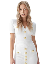 Thumbnail for Woman wearing a white dress with gold buttons on a white background