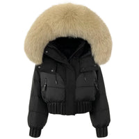 Thumbnail for Black puffer jacket with beige fur hood on a white background