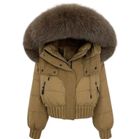 Thumbnail for Tan winter jacket with a large fur hood on a white background
