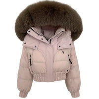 Thumbnail for Pink puffer jacket with a large fur hood on a white background