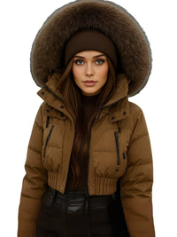Thumbnail for Woman wearing a brown winter jacket with a large fur hood on a white background