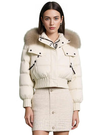 Thumbnail for Woman wearing a white puffer jacket with fur hood on a white background
