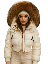 Thumbnail for Woman wearing a White puffer jacket with a large fur hood on a white background