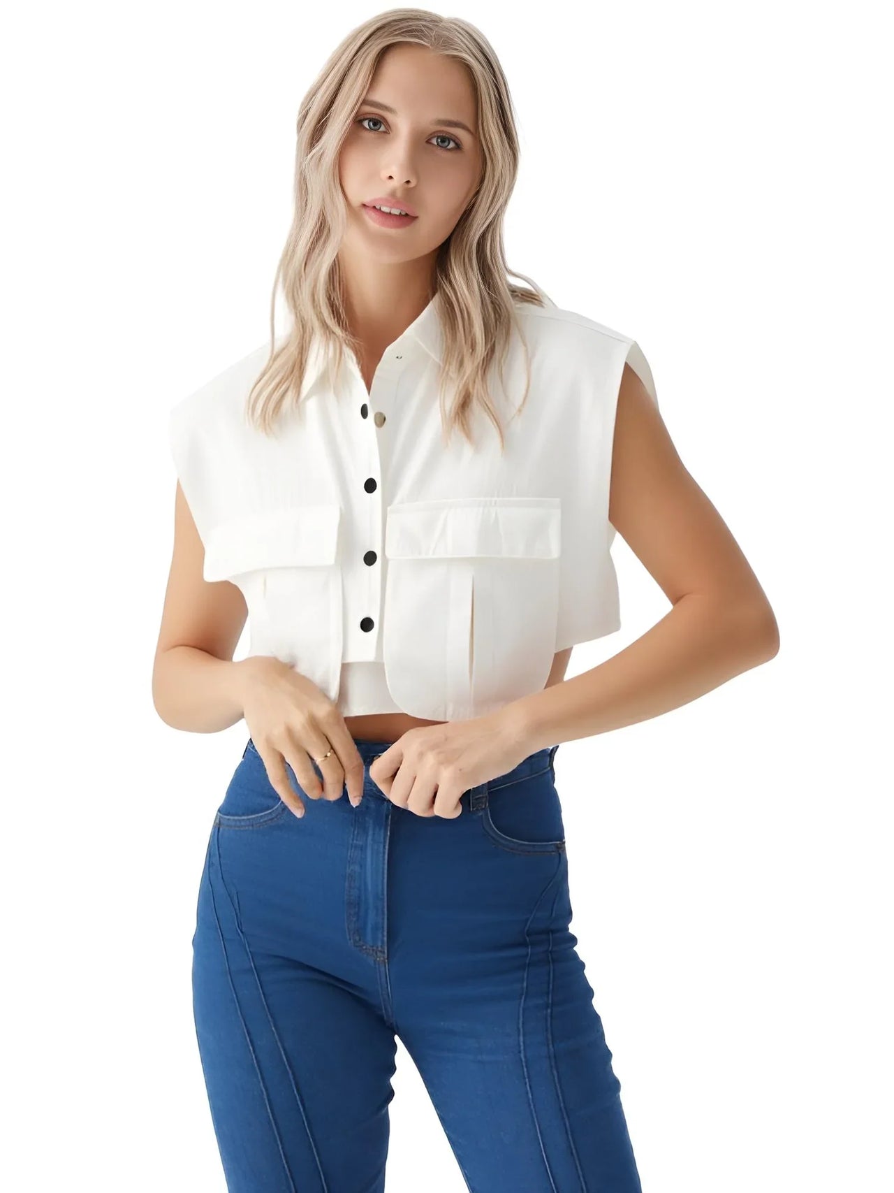Woman wearing a white sleeveless shirt and blue jeans on a white background