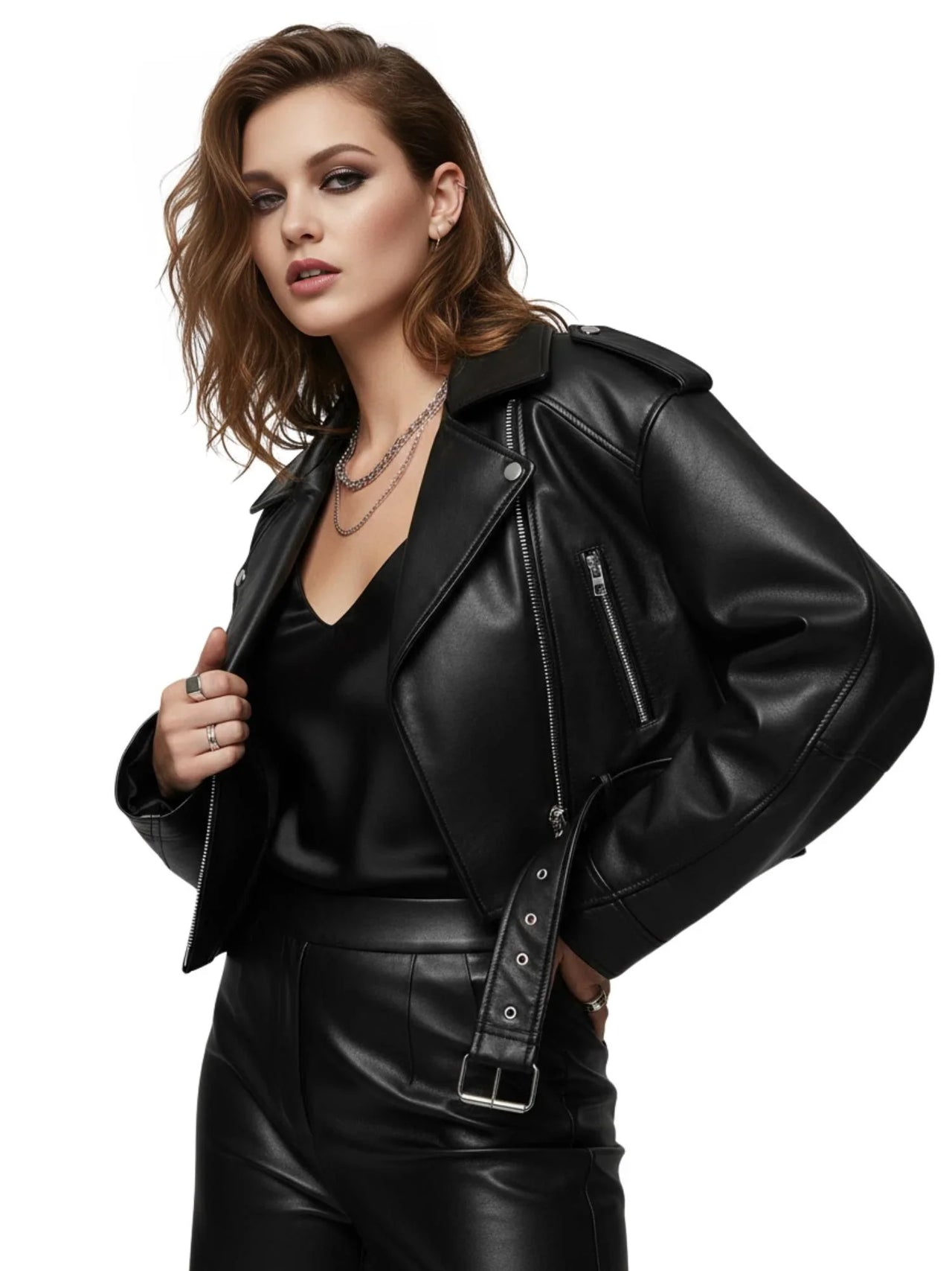 Woman wearing a black leather jacket on a white background