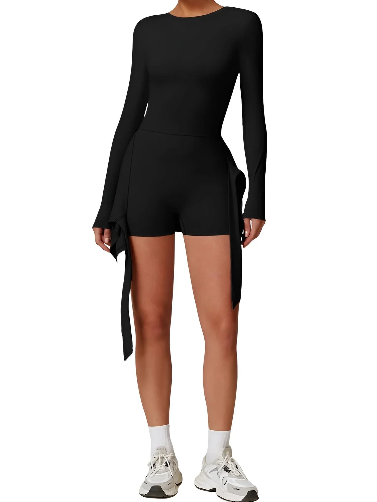 Person wearing a black long-sleeve top and shorts set on a white background