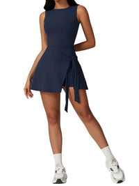 Thumbnail for Navy blue sleeveless dress with a tie waist worn by a model on a white background