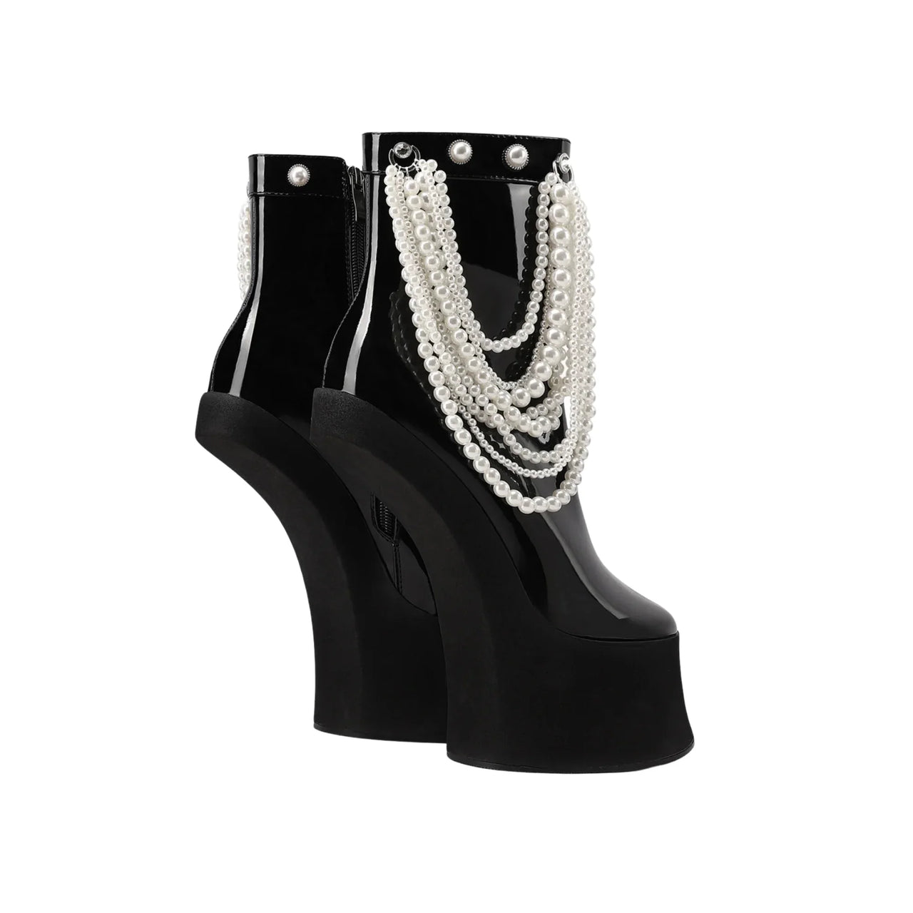 Black high-heeled shoes with pearl embellishments on a white background