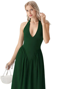 Thumbnail for Woman wearing a green dress with a white background