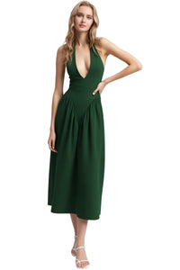Thumbnail for Woman wearing a green dress on a white background