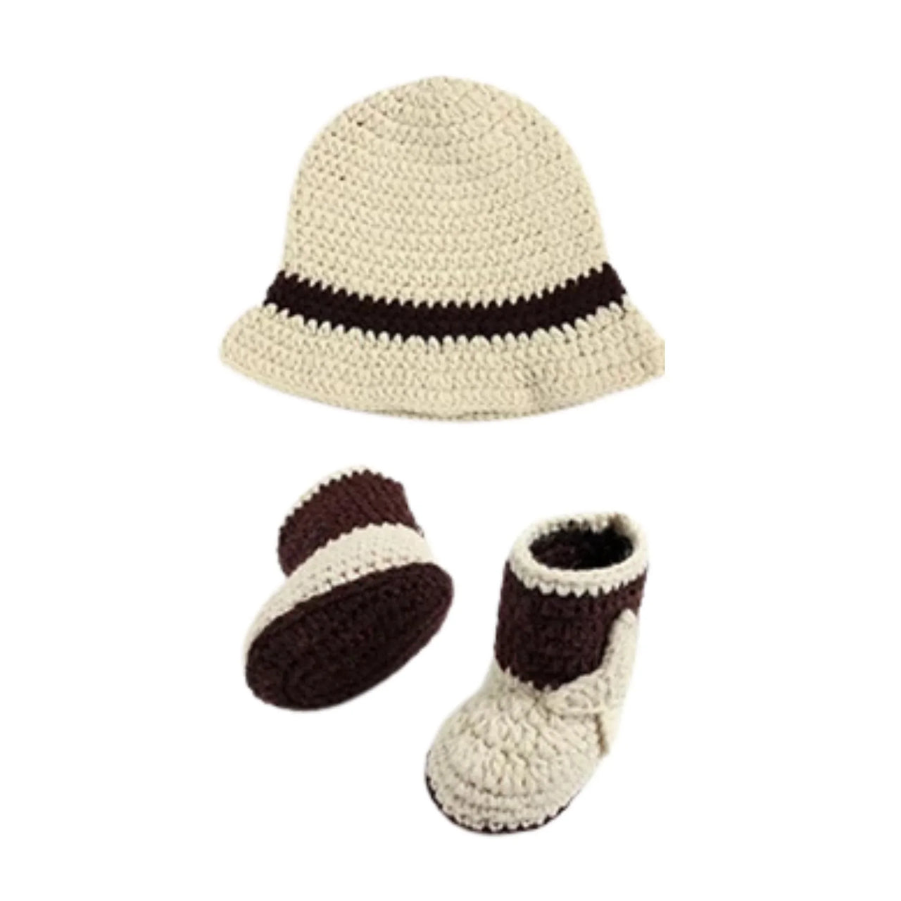 Crocheted baby hat, booties, and mittens set on a white background