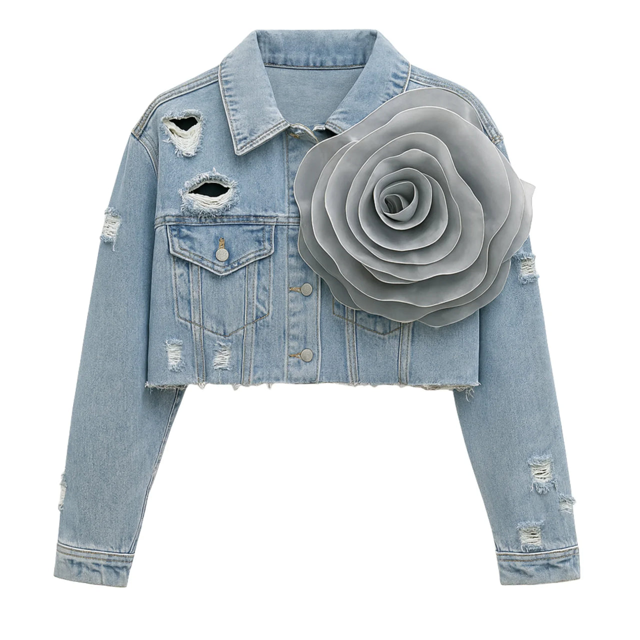 Blue denim jacket with a large gray flower applique on a white background