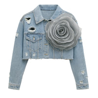 Thumbnail for Blue denim jacket with a large gray flower applique on a white background
