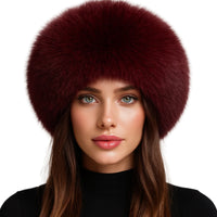 Thumbnail for Woman wearing a dark red fox fur hat on a white background
