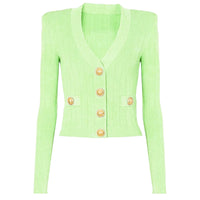 Thumbnail for Light green cardigan with gold buttons on a white background