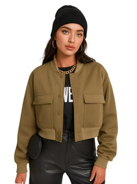 Thumbnail for Woman wearing a green jacket, black beanie, and black pants on a white background