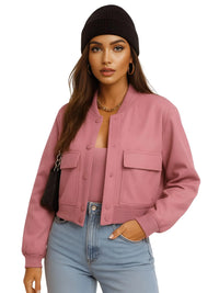 Thumbnail for Woman wearing a pink bomber jacket, black beanie, and light blue jeans on a white background