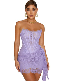 Thumbnail for Woman wearing a purple lace mini dress on a white background