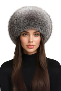 Thumbnail for Woman wearing a silver fox fur hat on a white background