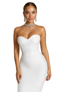Thumbnail for Woman wearing a strapless white bustier with a white pencil skirt and a choker necklace on a white background