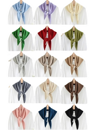 Thumbnail for Collection of wool scarves in various colors draped over white shirts on hangers.