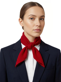 Thumbnail for Woman wearing a red wool scarf and navy blazer on a white background