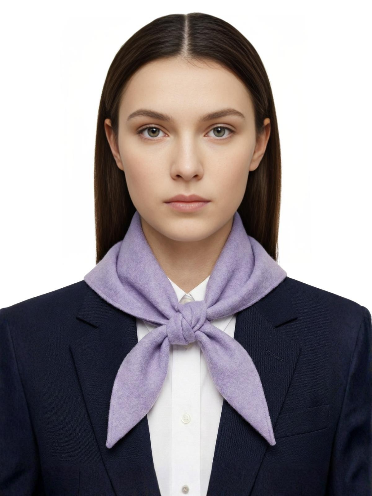 Woman wearing a purple wool scarf around her neck against a white background