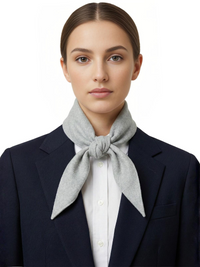 Thumbnail for Woman wearing a gray wool scarf around her neck with a white background