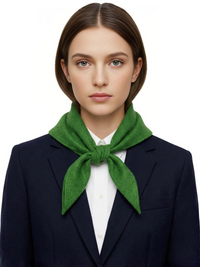 Thumbnail for Woman wearing a green wool scarf and navy blazer on a white background