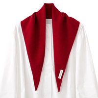 Thumbnail for Red wool scarf draped over a white shirt on a white background