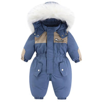 Thumbnail for Blue baby snowsuit with white fur hood on a white background