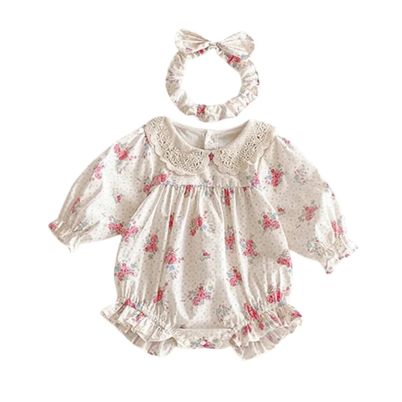 Baby romper with floral pattern and matching headband on a white background