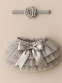 Thumbnail for Gray tutu skirt with bow and matching headband on a beige background