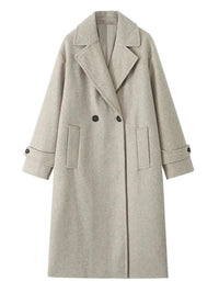 Thumbnail for Long beige double breasted coat with pockets and turn down collar on a white background
