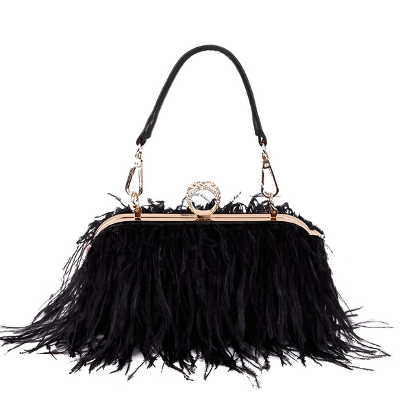 Shop Drestiny for the chic Black Ostrich Feather Clutch! With a removable shoulder strap and satin interior, it's a must-have accessory. Enjoy free shipping and let us cover the tax. Don't miss out on up to 50% off for a limited time!